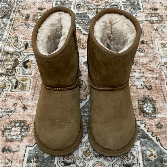 Ugg Cozy Tan Shearling Boots
Great condition!! 
Super cute for your little one! - Picture 1 of 5